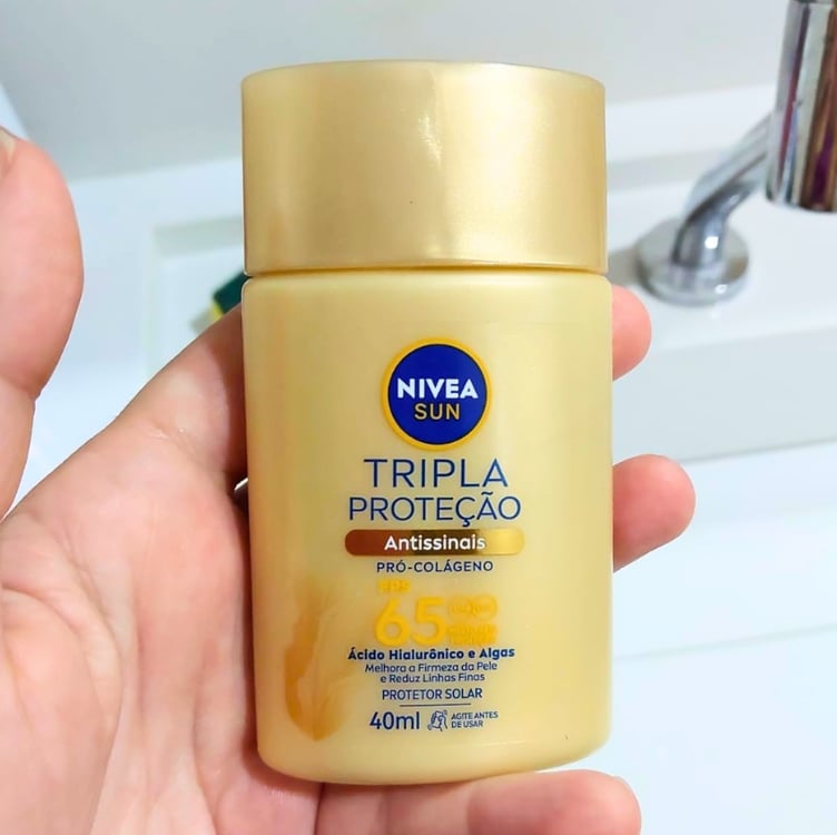 NIVEA SUN Protetor Solar Fluido Facial Tripla Proteção Antissinais FPS 65 40ml NIVEA SUN Protetor Solar Fluido Facial Tripla Proteção Antissinais FPS 65 40ml