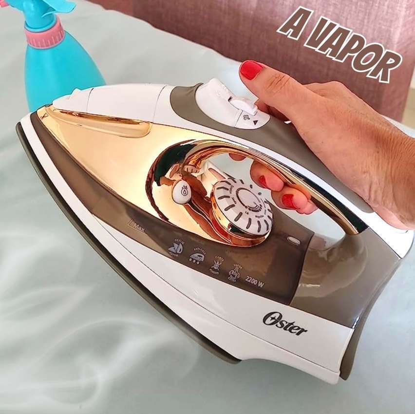 Ferro A Vapor Oster Ultra Care, Base Cerâmica Aerodinâmica, 110V, Champagne/Branco, 1500W, GCSTSP6206 Ferro A Vapor Oster Ultra Care, Base Cerâmica Aerodinâmica, 110V, Champagne/Branco, 1500W, GCSTSP6206